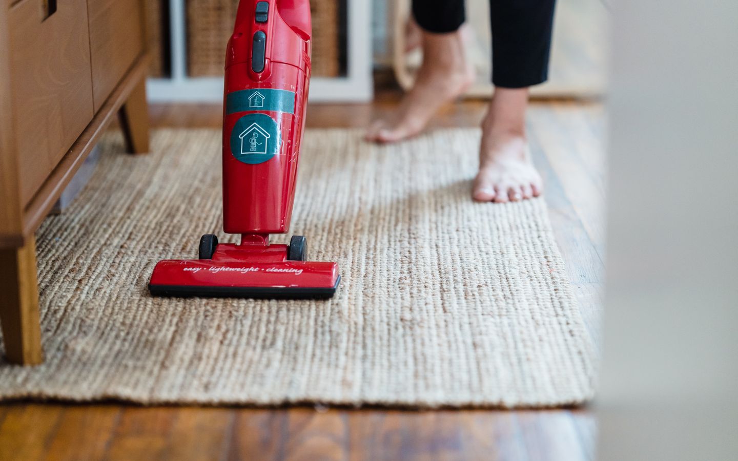 Carpet being vacuumed carefully during an in-home floor-care service